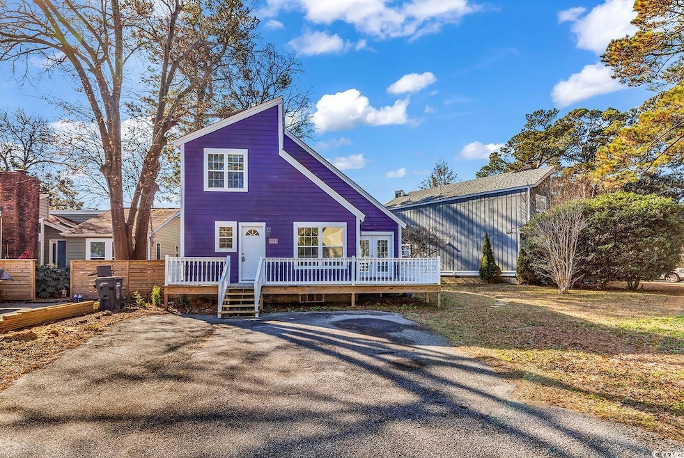 View of front of property with a deck