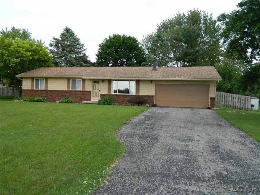 Situated back off the road with a long driveway fo