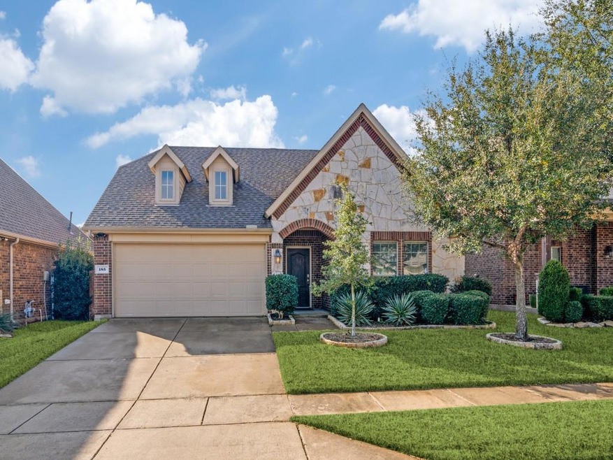 View of front of property with a front yard
