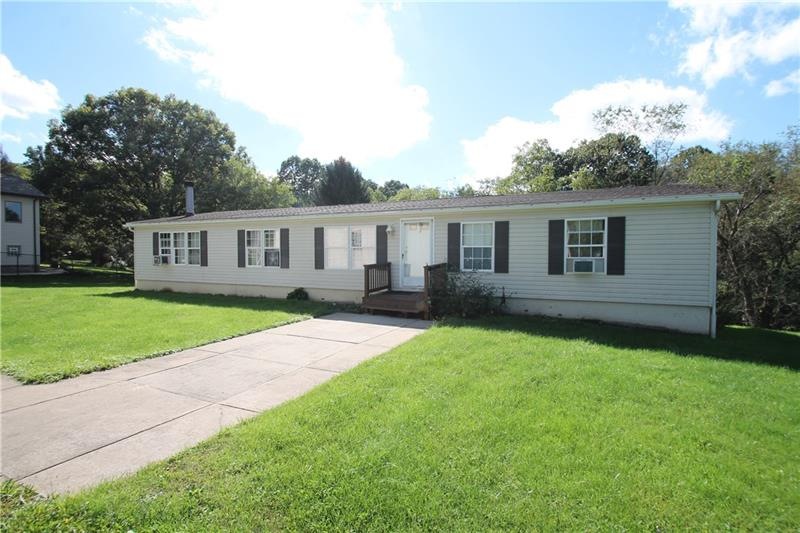 front of home. Much larger inside that it looks. F