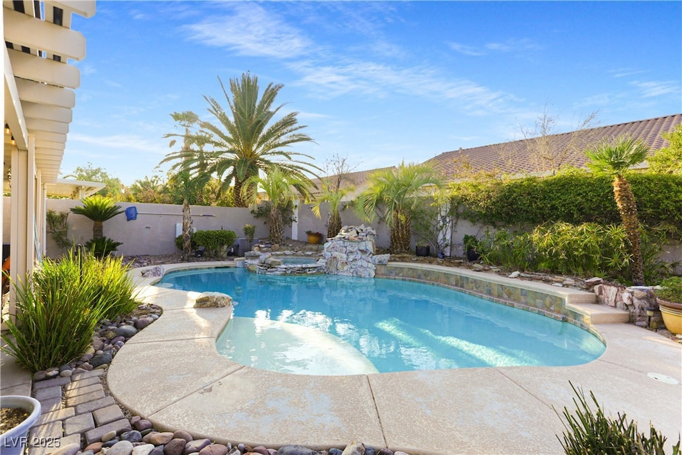 Dive into relaxation with this inviting pool and s