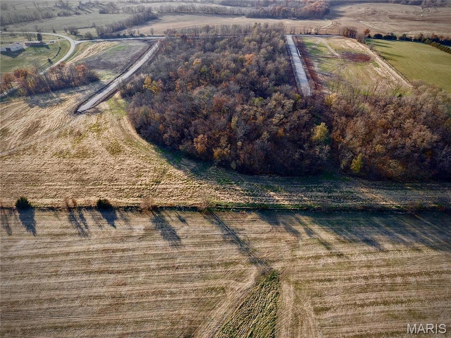 Aerial view of property's location featuring rural landscape