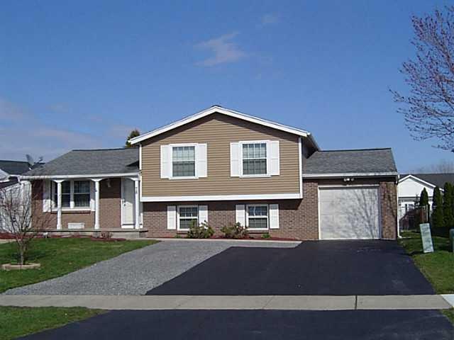 Exterior Front. Cathedral ceilings in Living Room 