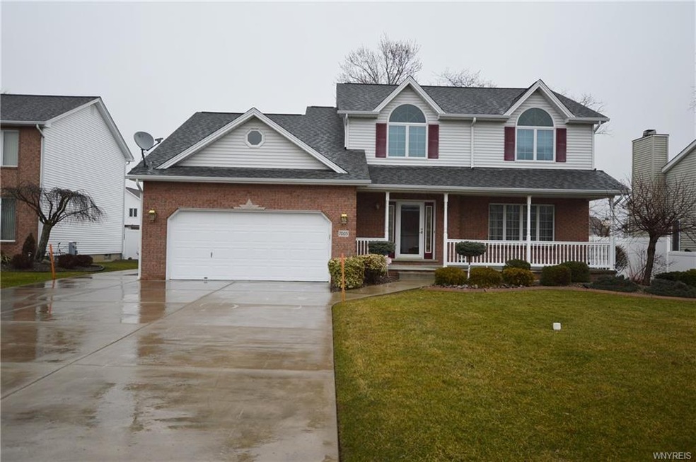 Maintenance free brick and vinyl colonial with ing