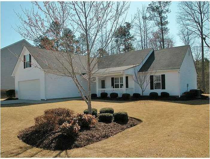 Exterior Front. Beautifully maintained, light and 