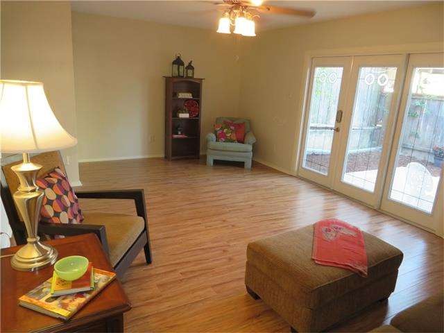 Spacious family room with fresh interior paint, gl