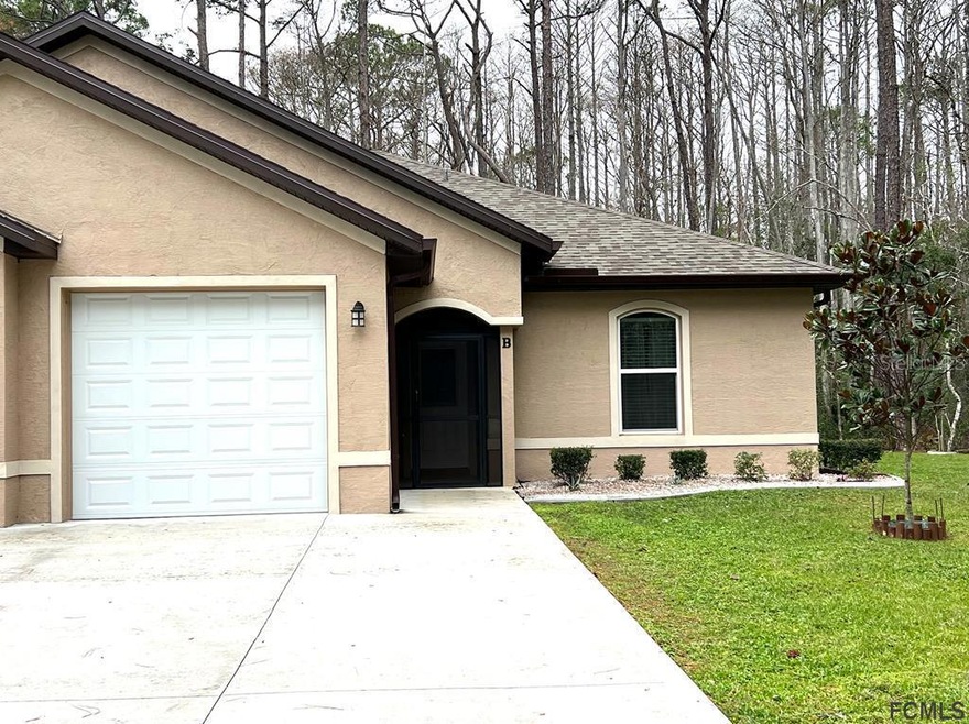 11 Ullock Place unit B, Palm Coast, FL 32164 - photo 1