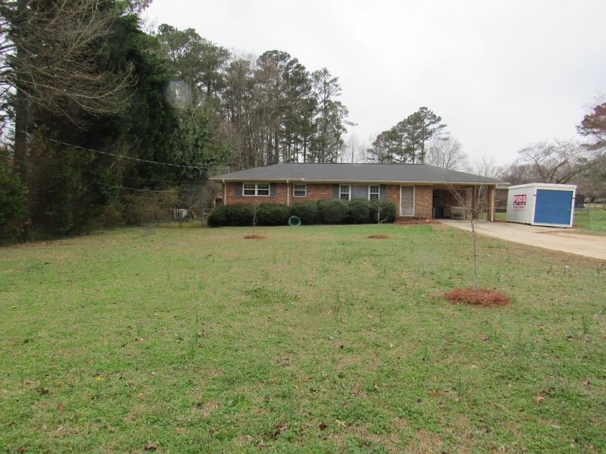 Level front yard and driveway.