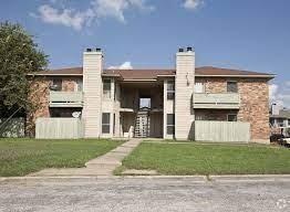 View of property with fence