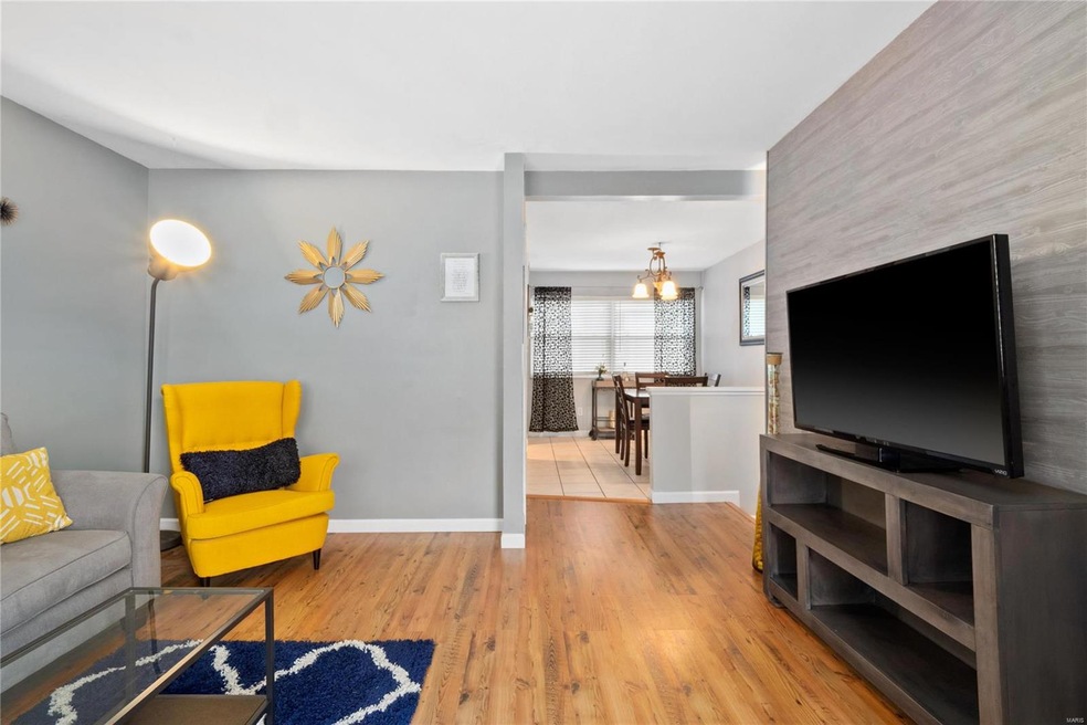 Spacious living room with attractive accent wall.