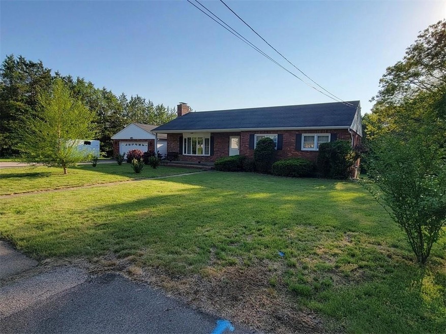 FRONT OF HOME. DRIVEWAY IS PAVED AND HAS PLENTY OF