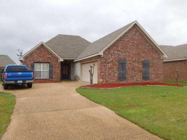 The home is a court yard entry.
