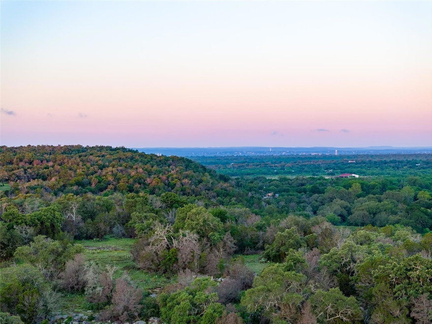 Aerial view of property's location with a heavily