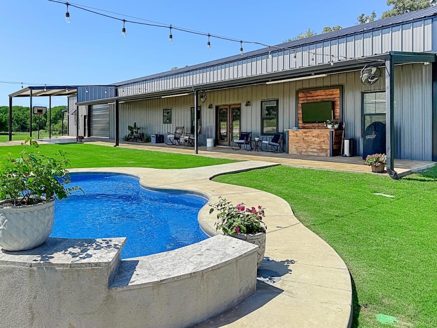 Rear view of property with french doors, a patio 