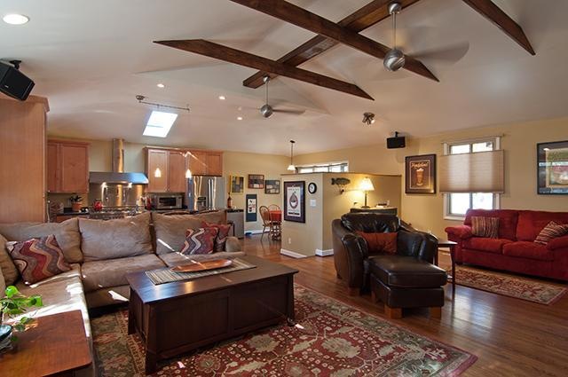 Not your typical ranch home! This area was gutted and the kitchen was created out of the original garage. One small step from the living room leads to the custom, chef's kitchen complete with an imported, Italian gas range. 