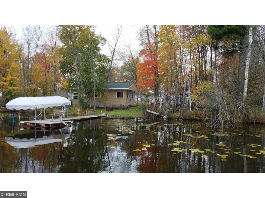Cabin lake view with dock