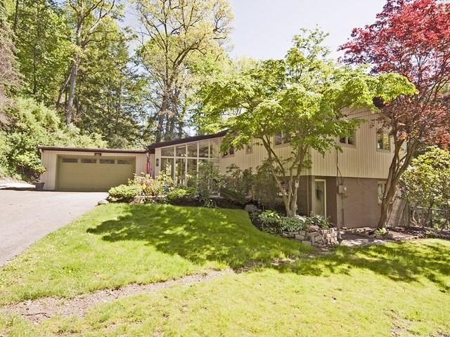 Front approach to home with attached garage
