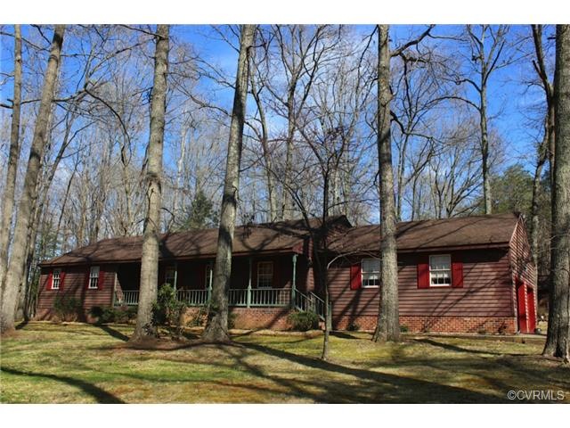 This spacious rancher sits up on 4 acres.