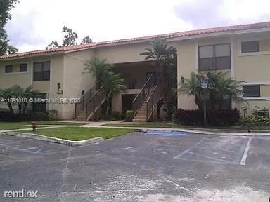 1661 Balfour Point Dr unit C, West Palm Beach, FL 33411 - photo 1