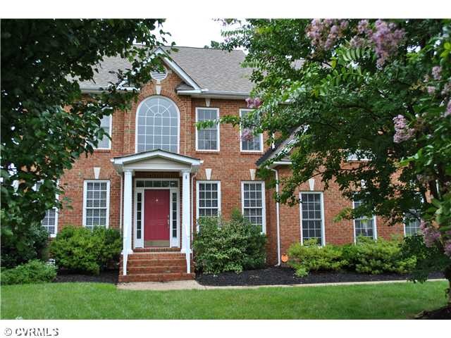 Exterior Front - Brick front, lovely mature landsc
