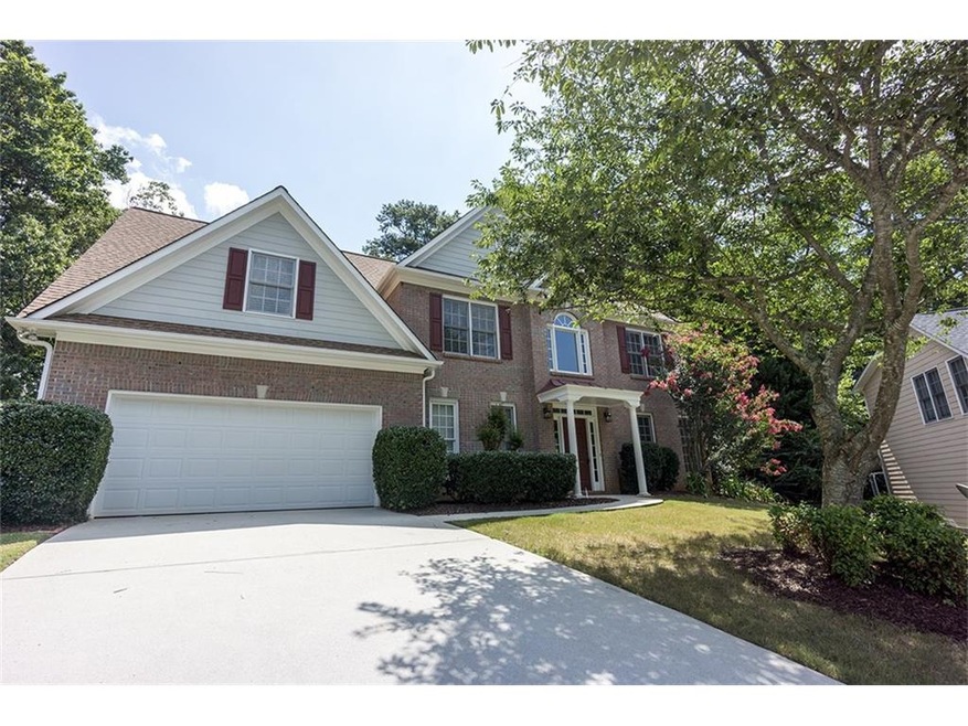 Traditional brick front home with newer architectu