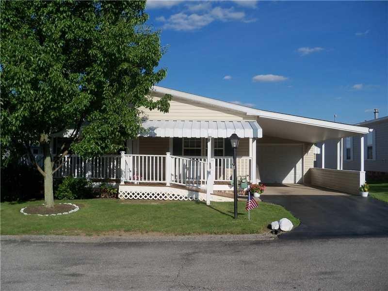 Exterior Front. Large Porch with Ramp Makes for Ea