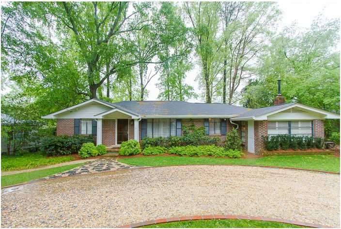 Exterior Front. Charming brick ranch with pea grav