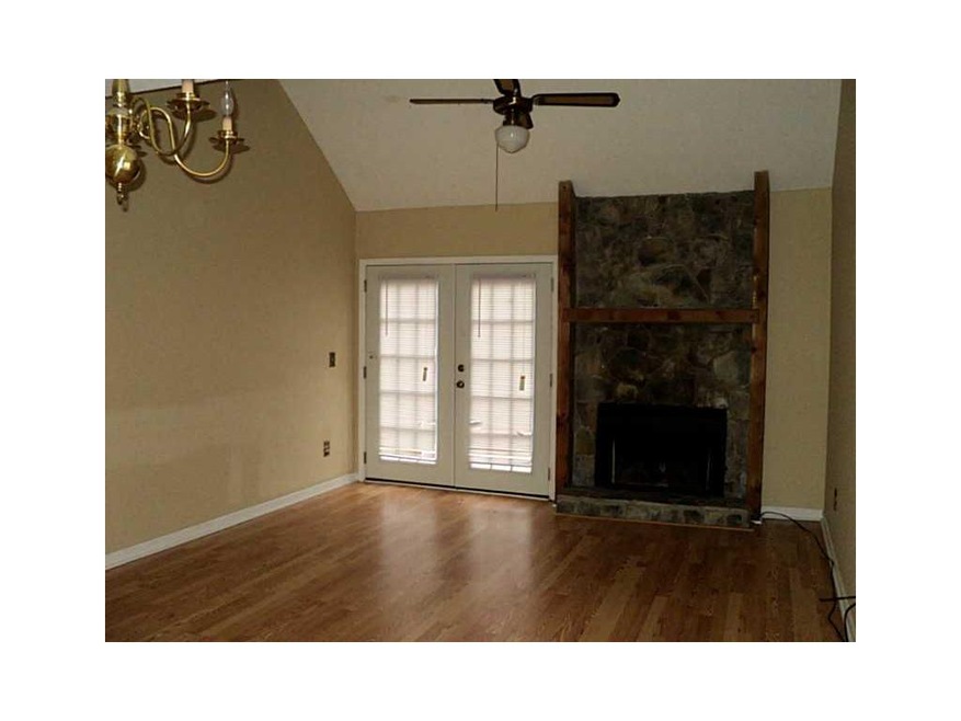 Exterior Front. Living room with hardwood floors