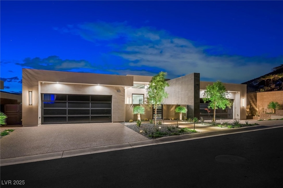 View of front facade featuring an attached garage,