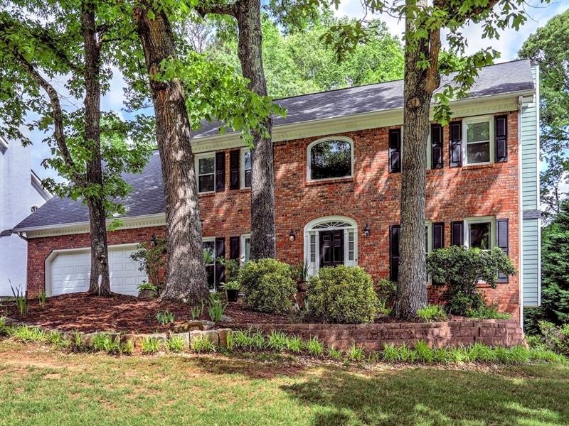 Welcome Home!  This lovely Brick & Hardiplank home