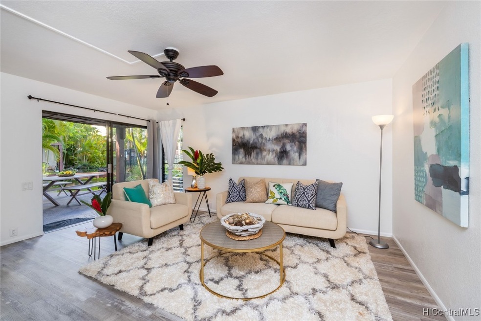 Living Room flows to outdoor covered lanai.