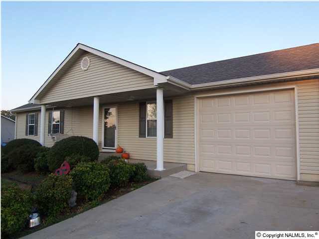 Ready to move in with new HVAC, hot water heater, roof & gutters, carpet, and paint!