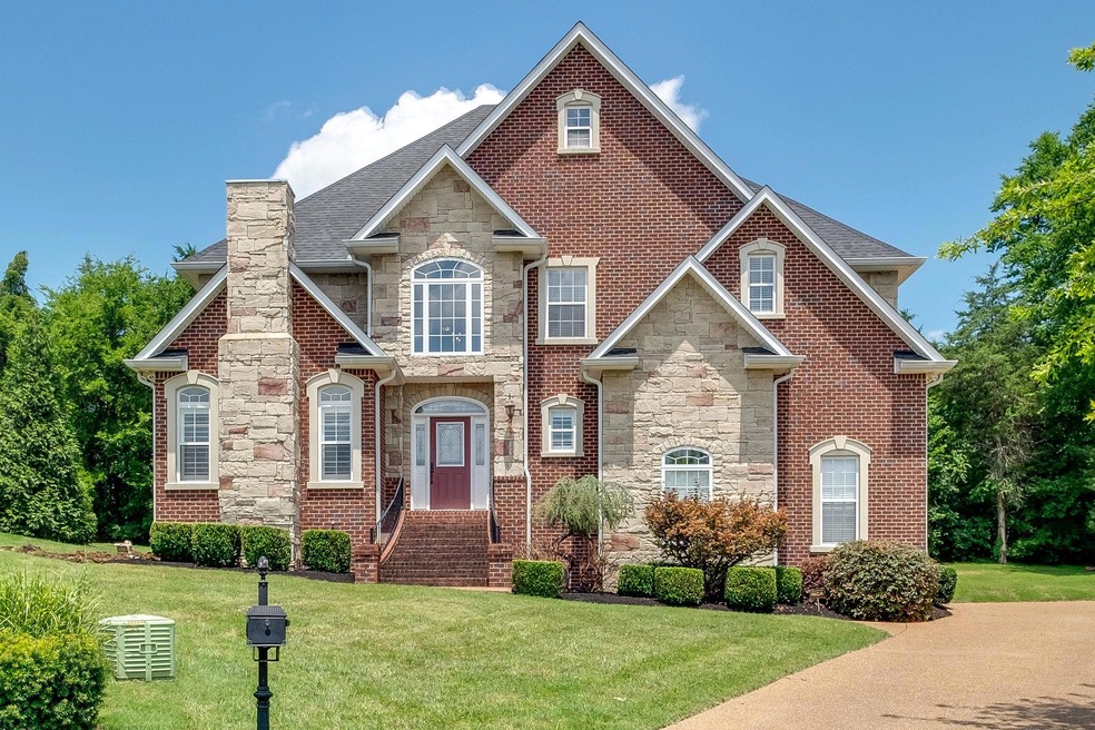 Distinguished Brick custom home with custom brick & stone finishes, aggregate drive, Three (3) car garage (side entry), NEW dimensional shingles roof. Four (4) bedrooms, three (3) Baths, Approx. 3,212 square feet.