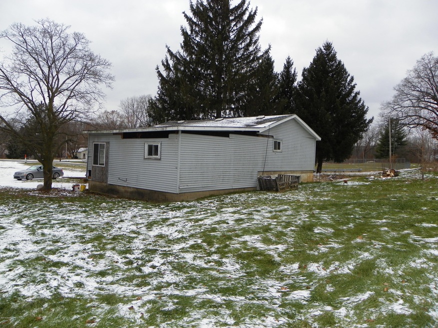 147 Homer St, Hubbardston, MI 48845 - photo 1