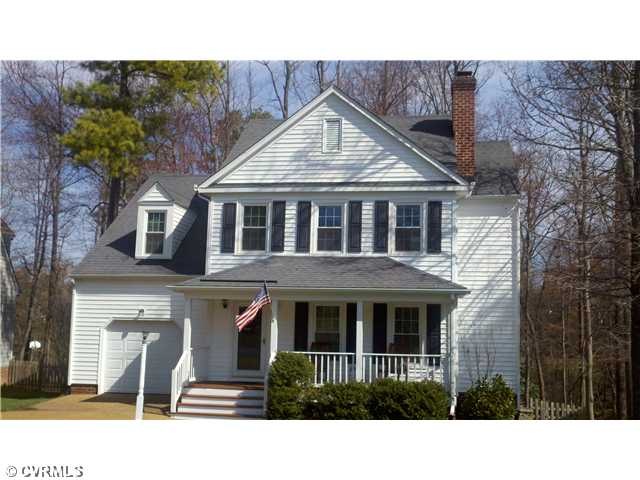Exterior Front - Vinyl siding and windows have bee