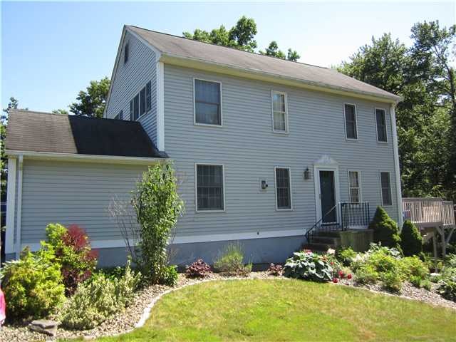 Exterior Front. Beautiful landscaped yard