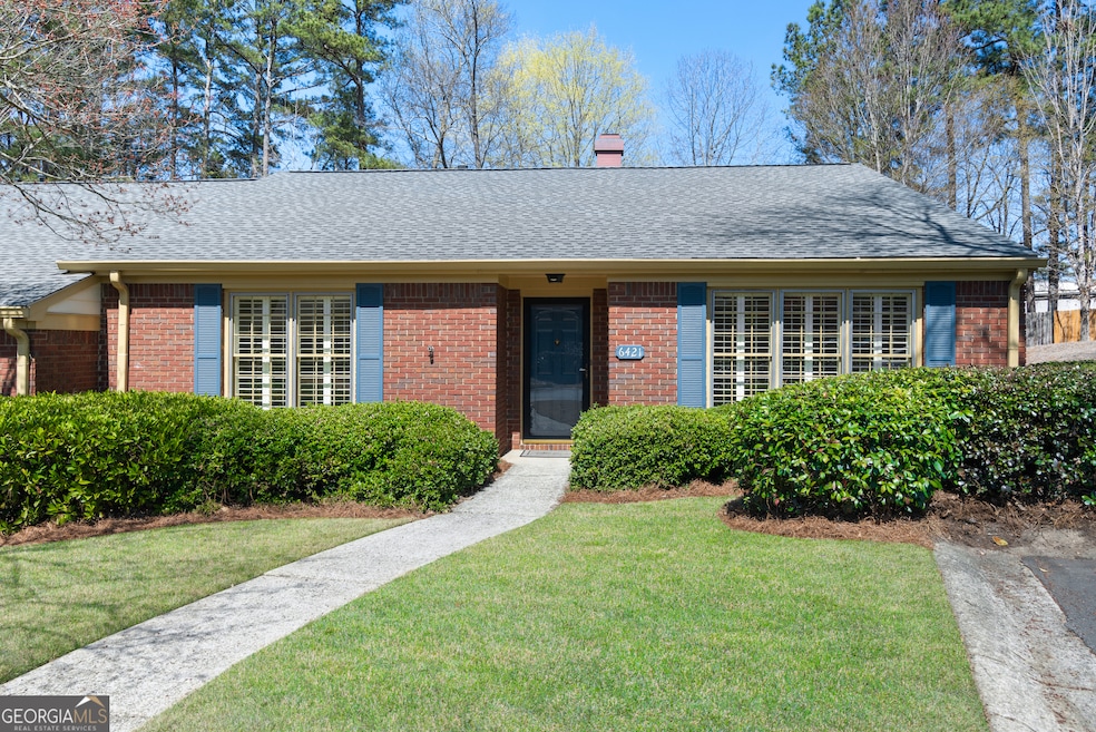 Brick Ranch-patio end unit townhome featuring new 