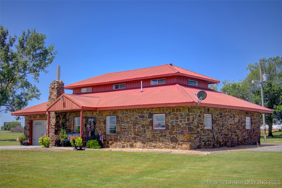 Country living at its best.  Don't you just love a metal roof?