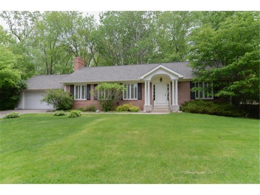 Charming one story home situated on a nearly 1/2 a