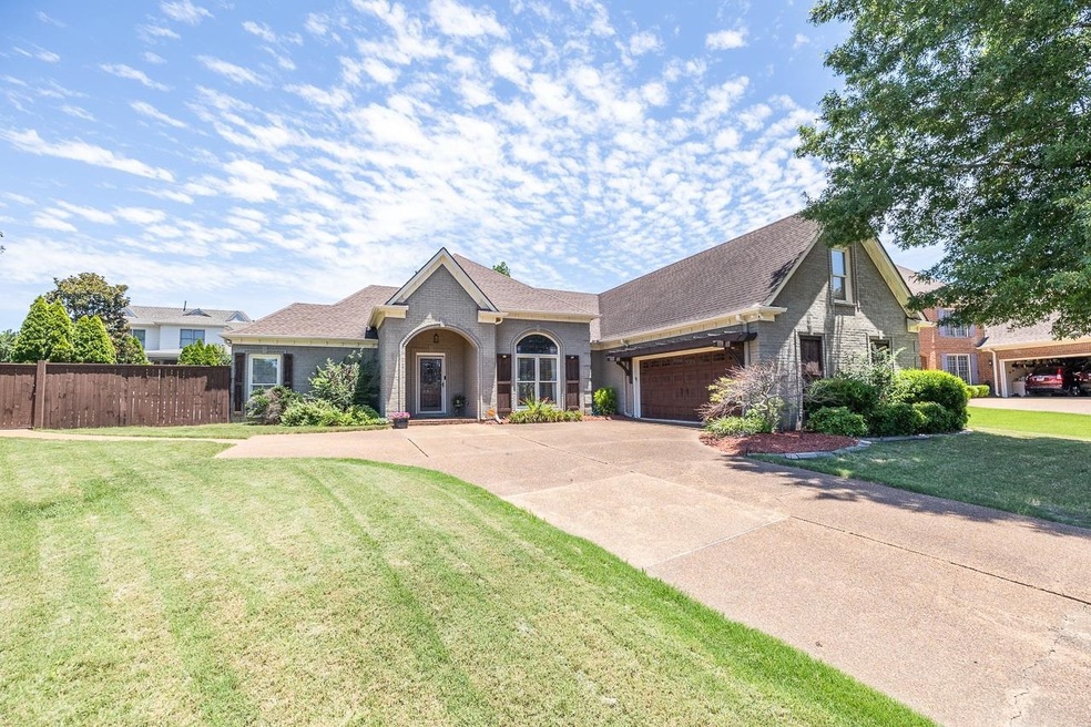 View of front of property featuring a garage and a