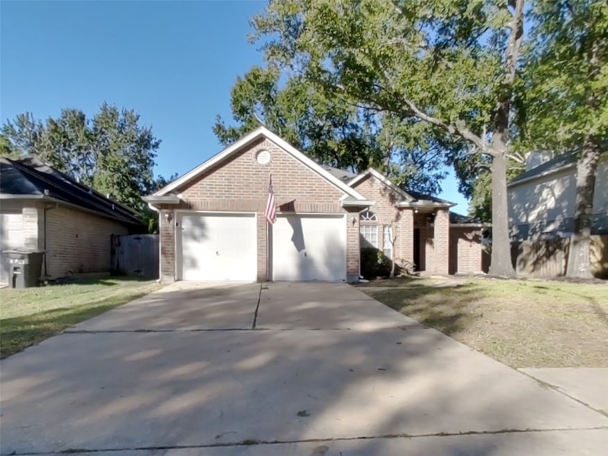 18707 Singing Woods Dr, Humble, TX 77346 - photo 1