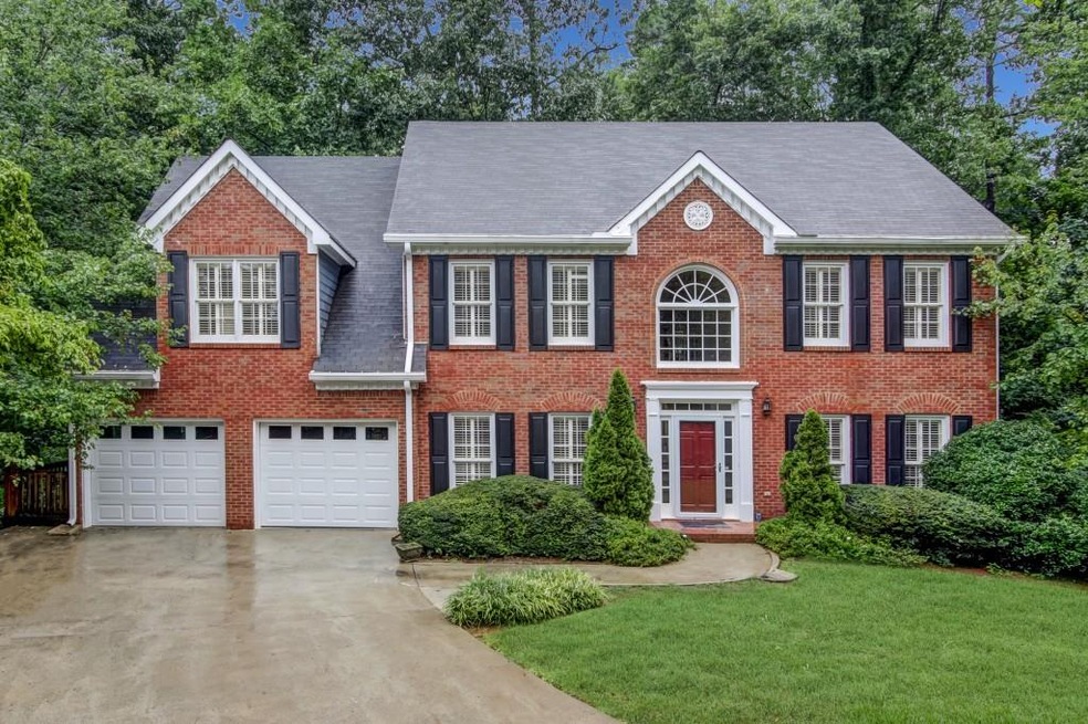 Stately brick home on picture perfect large cul-de