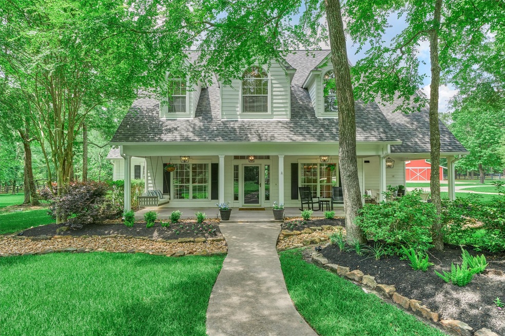 Black & white country farmhouse home with all the modern comforts. Located on a private cul-de-sac lot, over 3 acres in highly desired High Meadow Ranch.