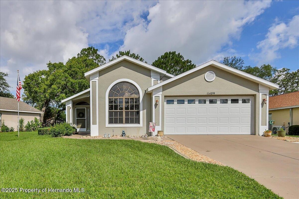 11409 Deercroft Ct, Spring Hill, FL 34609 - photo 1