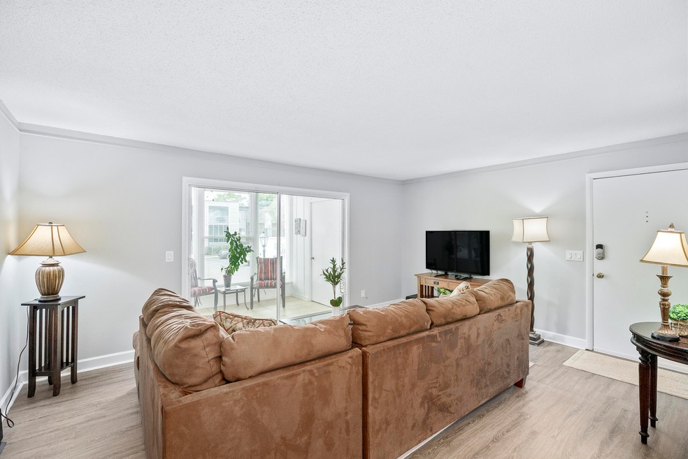 Living Room with view of sunroom