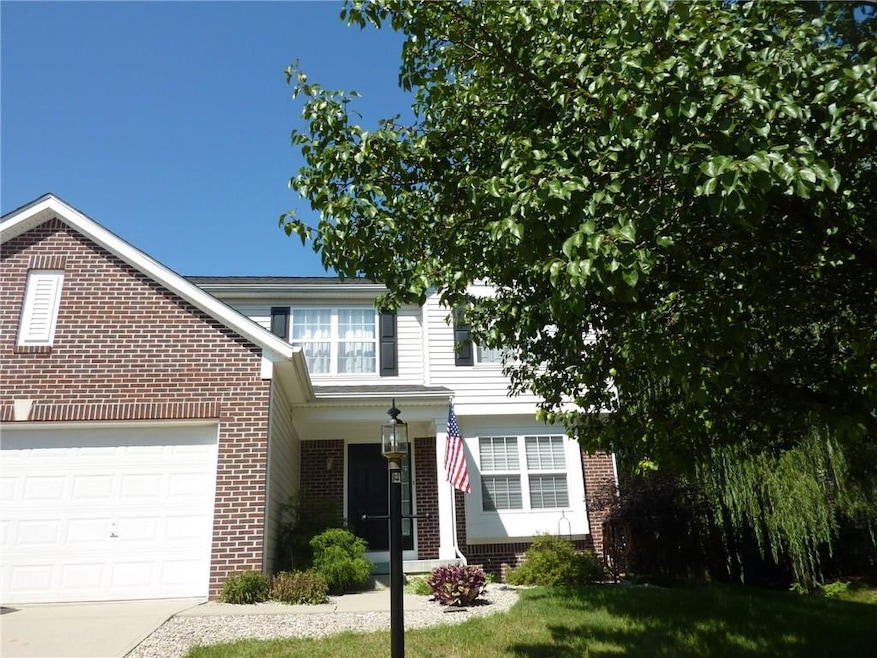 Dramatic front elevation. Mature trees for plenty of shade.