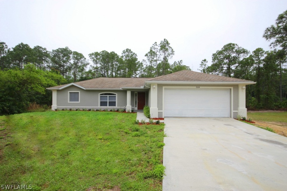 2004 Yuma Ct, Lehigh Acres, FL 33972 - photo 1