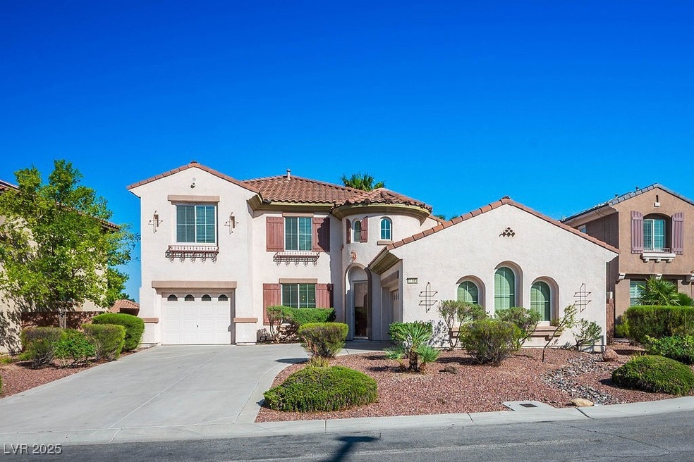 Mediterranean / spanish-style home featuring a til