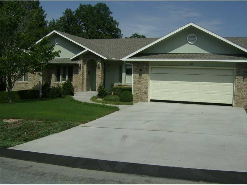Exterior Front. Beautiful landscaping, flat drive,
