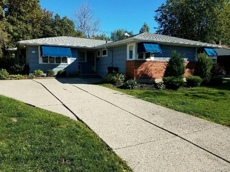 EXTERIOR FRONT-DOUBLE WIDE DRIVEWAY, MATURE LANDSC